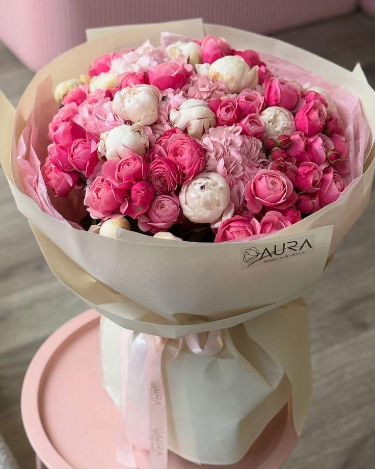 Corporate meeting room with carefully timed floral arrangements that maintain elegance throughout business hours